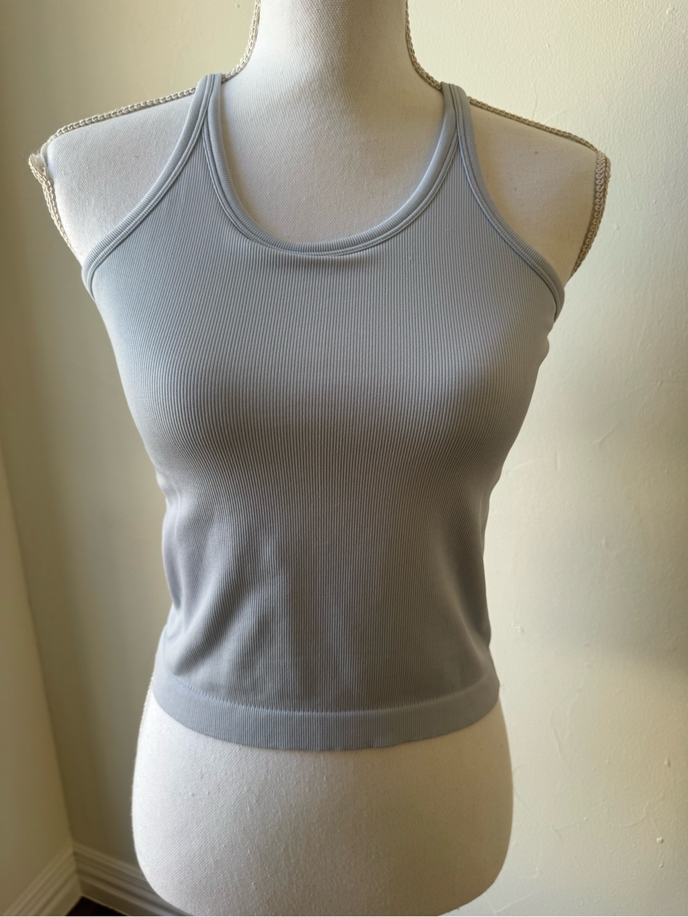 Light icy blue athleta girl tank top with shelf bra - like new